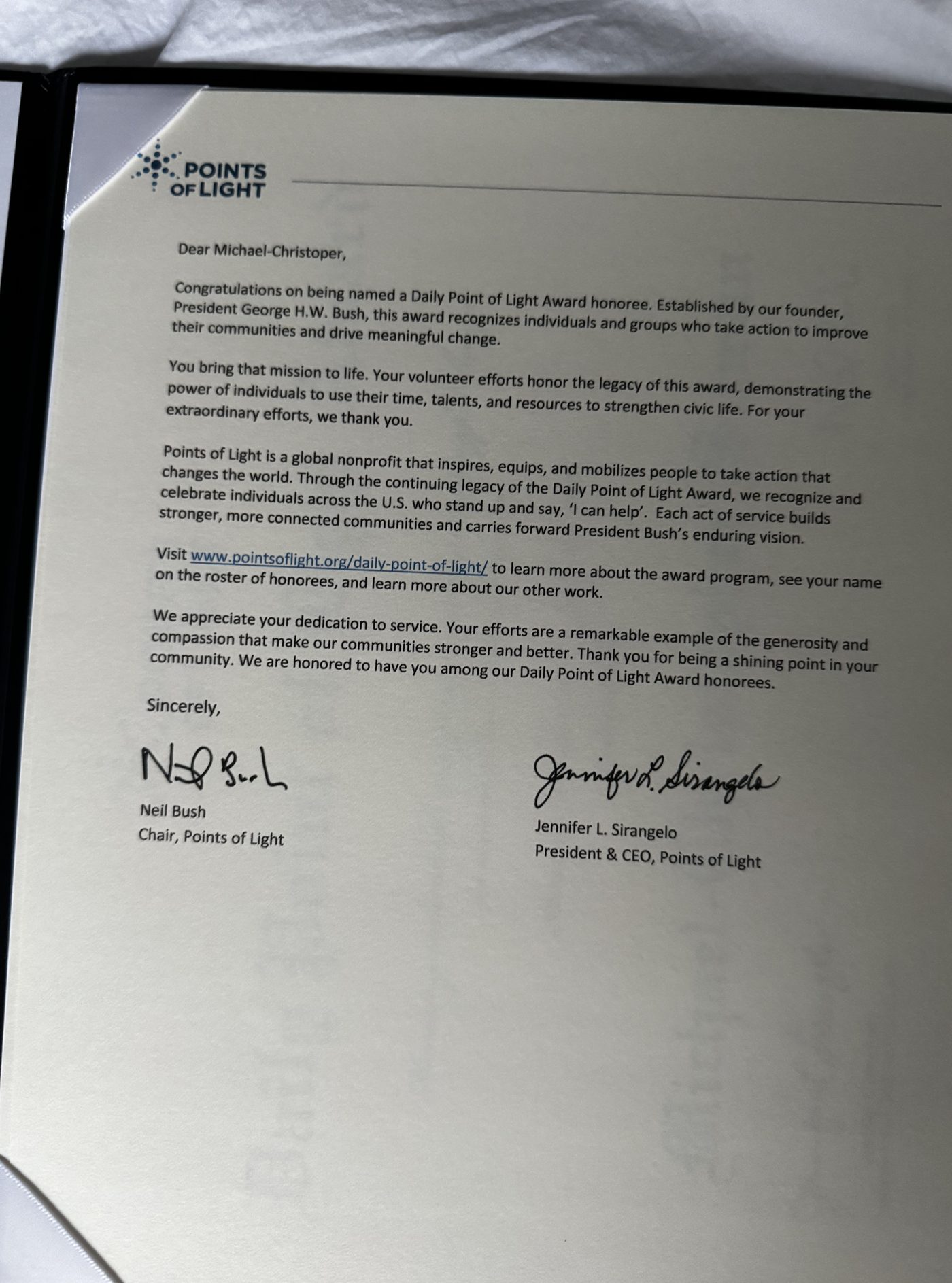 Congratulatory letter from Points of Light naming Michael-Christopher Suman a Daily Point of Light Award honoree, signed by Chair Neil Bush and President & CEO Jennifer L. Sirangelo